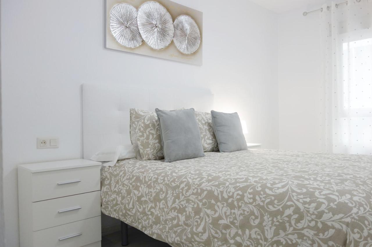 Apartamento Playa Velilla Park II อัลมูเญการ์ ภายนอก รูปภาพ